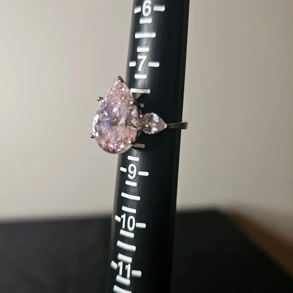 JTV Bella Luce 18.25 ctw Pink Pear-Cut and White Diamond Simulants Rhodium 925